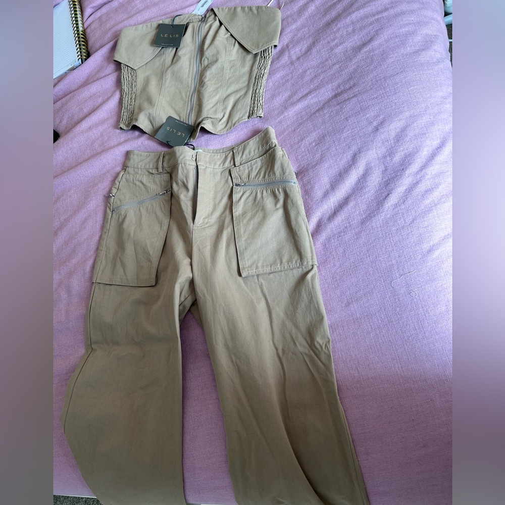 Two piece set. New with tags. Size large